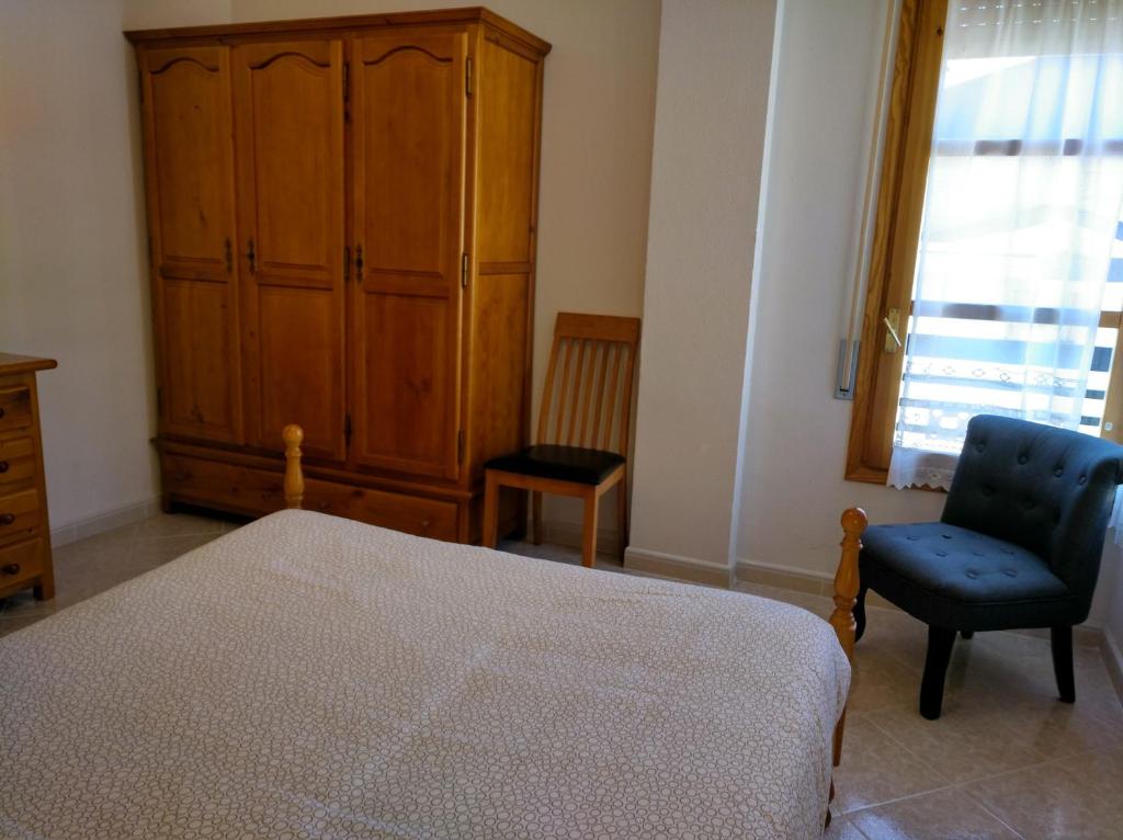 Postel nebo postele na pokoji v ubytování Best Biescas Tourist Home