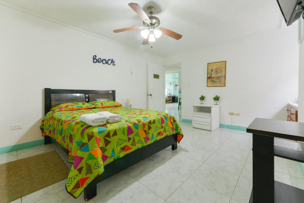 Cama ou camas em um quarto em Villa Sunny Days