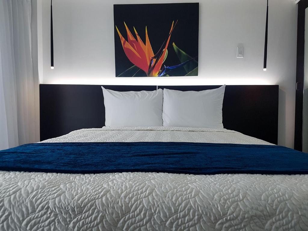 Postel nebo postele na pokoji v ubytování R Hotel Kingston