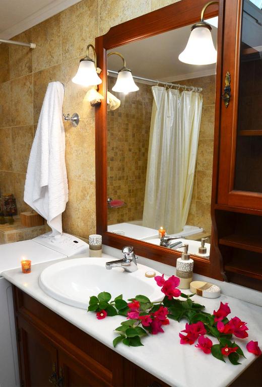 A bathroom at Kamara Stone House