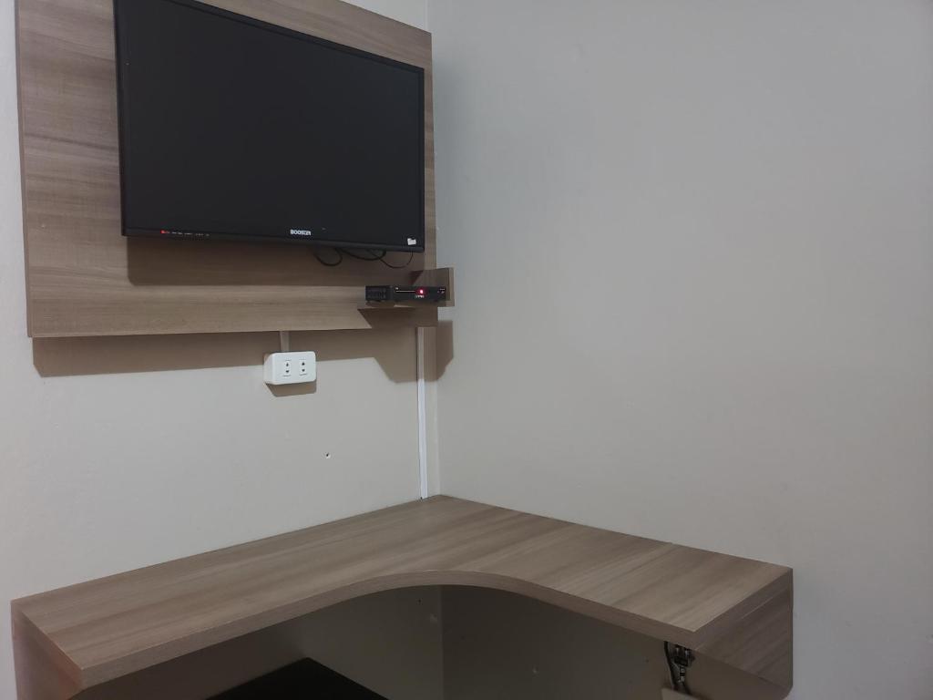 TV tai viihdekeskus majoituspaikassa Class Apart Hotel