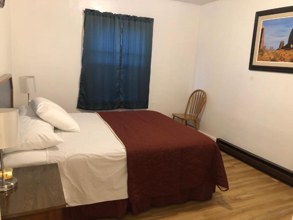 Postel nebo postele na pokoji v ubytování Angeles Motel