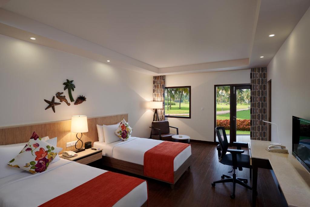 Postel nebo postele na pokoji v ubytování Holiday Inn Resort Goa by IHG