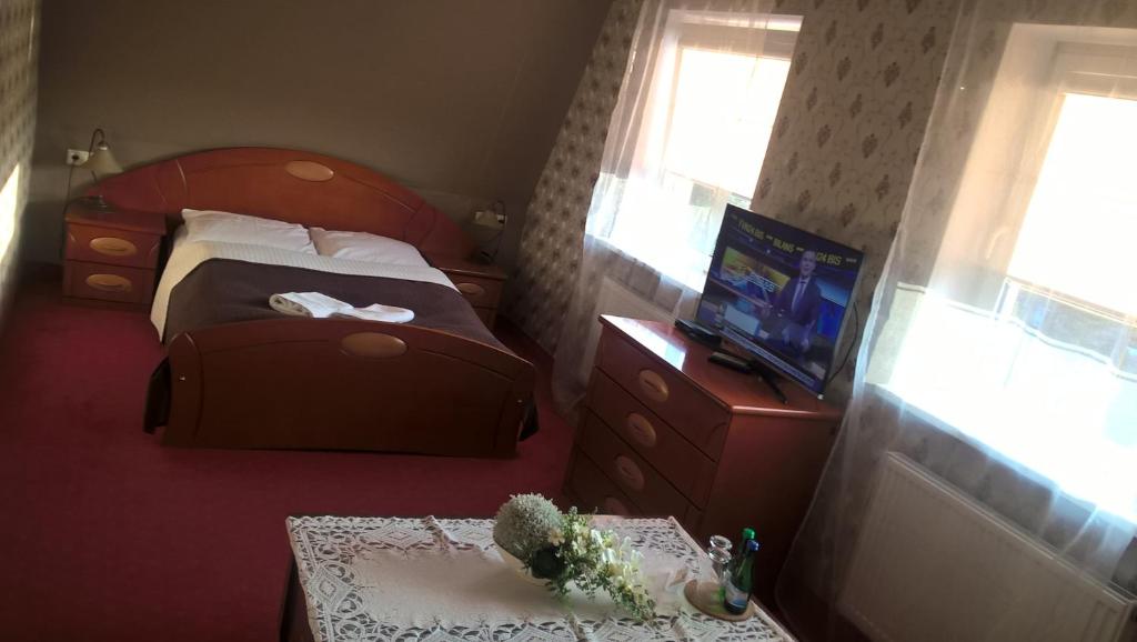 Postel nebo postele na pokoji v ubytování Villa Jaśmin