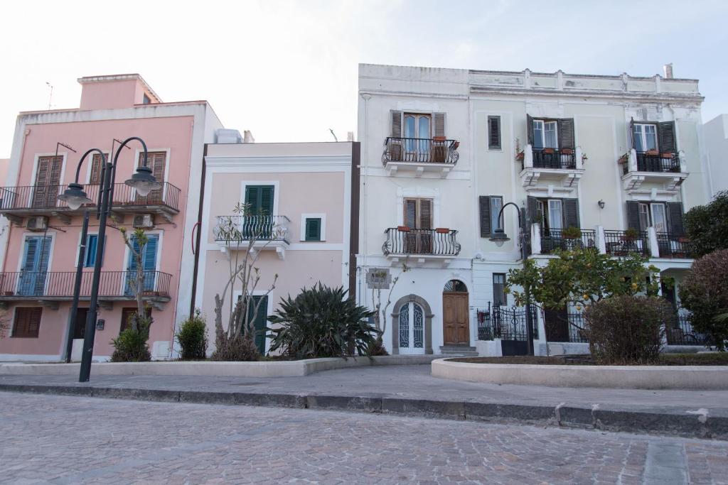 a group of buildings on a city street at B&B Il Castello in Lipari