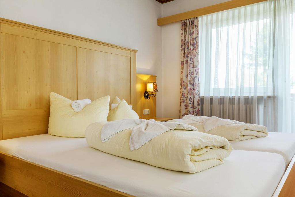 Postel nebo postele na pokoji v ubytování Ruperti - Gästehaus