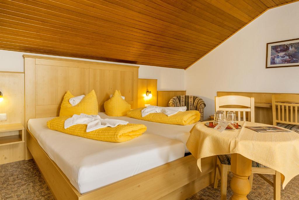 Postel nebo postele na pokoji v ubytování Ruperti - Gästehaus