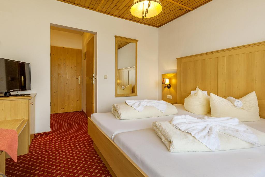 Postel nebo postele na pokoji v ubytování Ruperti - Gästehaus
