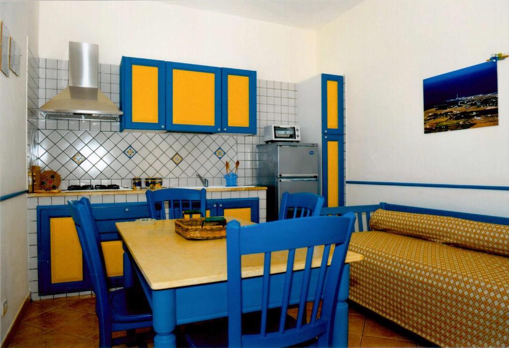 Kuchyň nebo kuchyňský kout v ubytování Residence Punta Longa