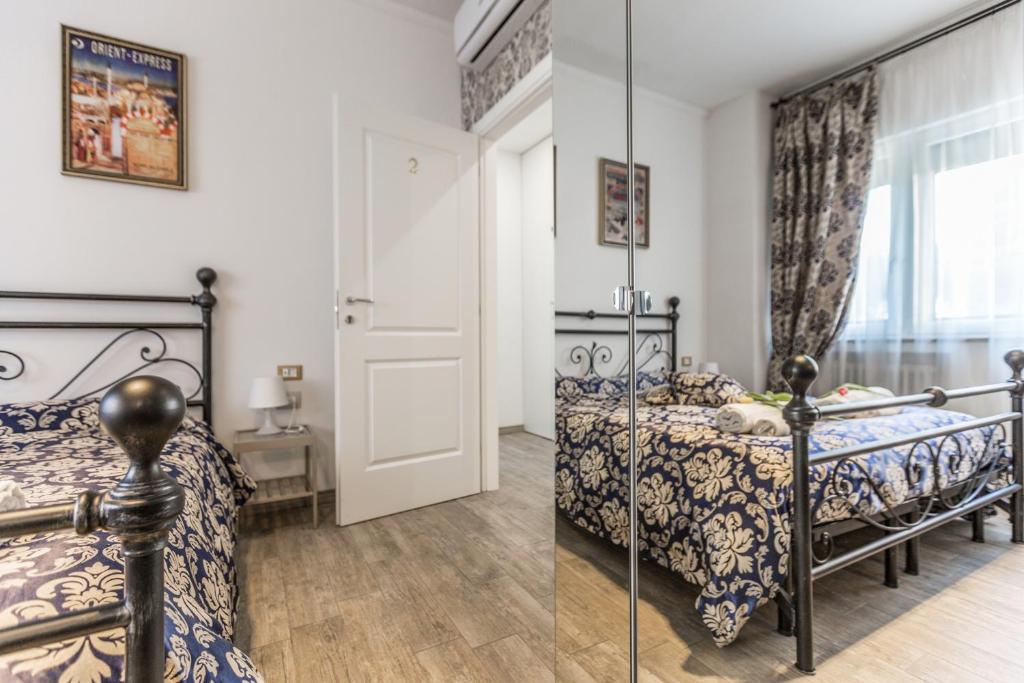 Postel nebo postele na pokoji v ubytování Central City Rooms