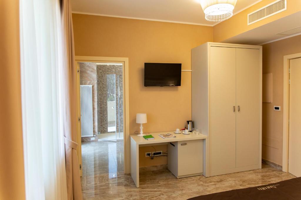 TV a/nebo společenská místnost v ubytování Aurum Suites