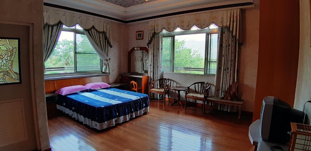 Postel nebo postele na pokoji v ubytování Ri Jing Yuan Homestay