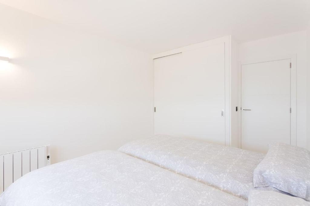 Postel nebo postele na pokoji v ubytování Maison Ses Covetes