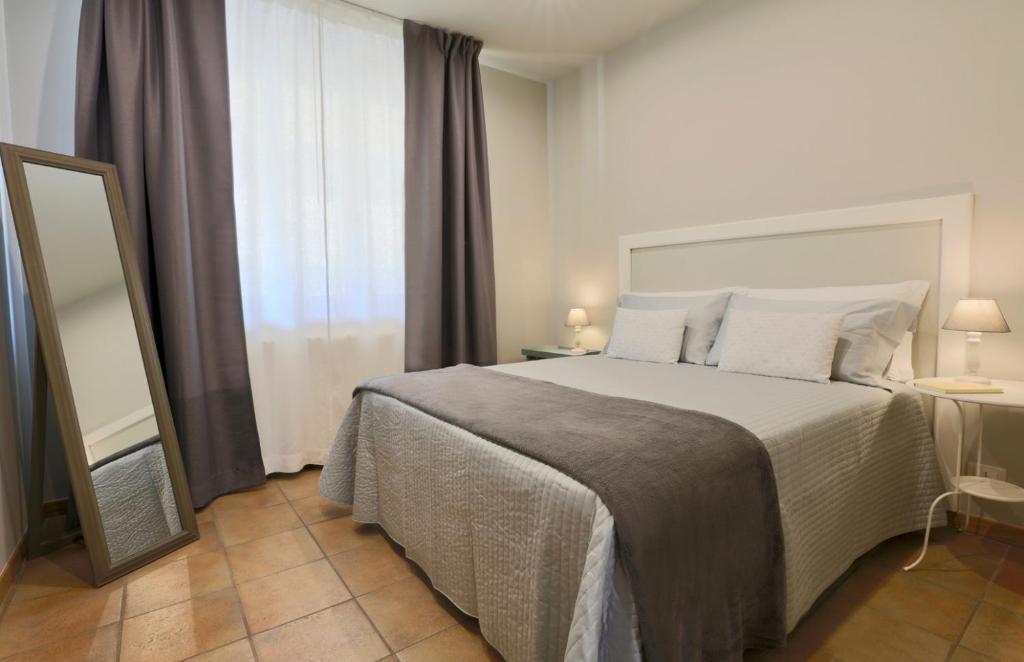 Postel nebo postele na pokoji v ubytování LE SETTE VIE HOLIDAY HOMES