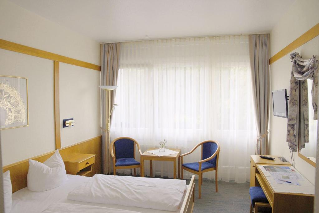 Postel nebo postele na pokoji v ubytování Hotel Gasthof Wasserschloß