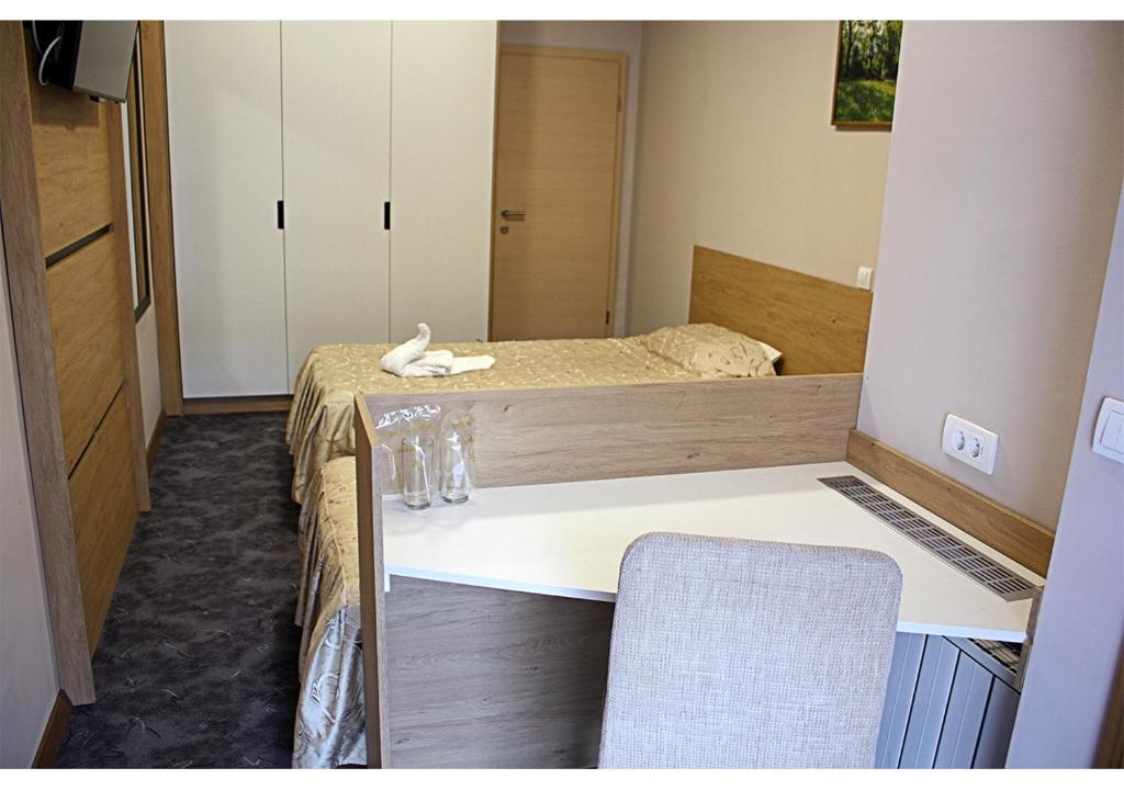 Postel nebo postele na pokoji v ubytování Hotel Ambasador