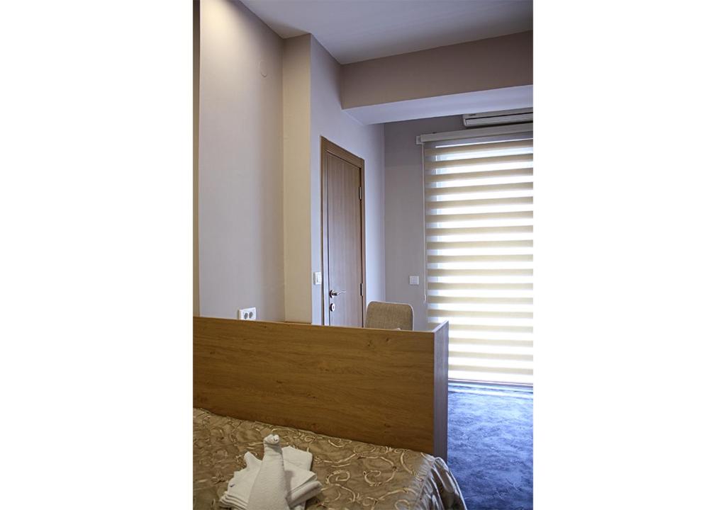 Postel nebo postele na pokoji v ubytování Hotel Ambasador