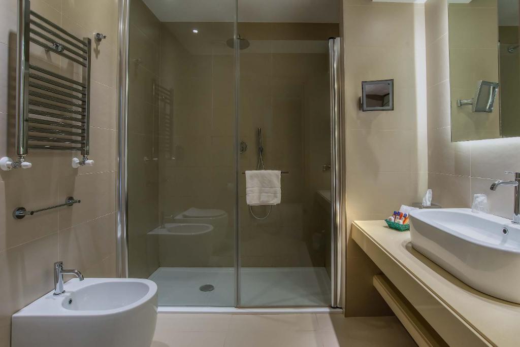 Koupelna v ubytování Hotel Genova