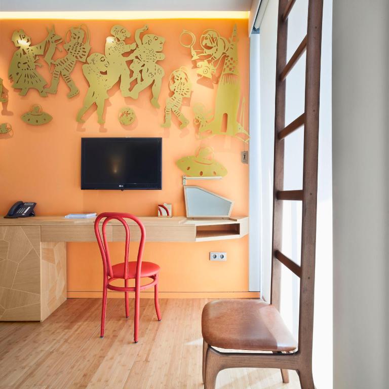 TV a/nebo společenská místnost v ubytování New Hotel