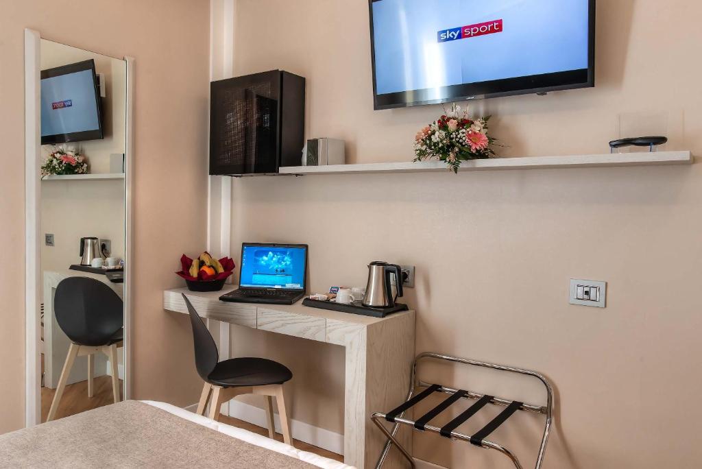 TV a/nebo společenská místnost v ubytování Hotel Memphis