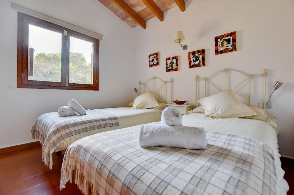Postel nebo postele na pokoji v ubytování Villa Bell Lloc by SOMNIA