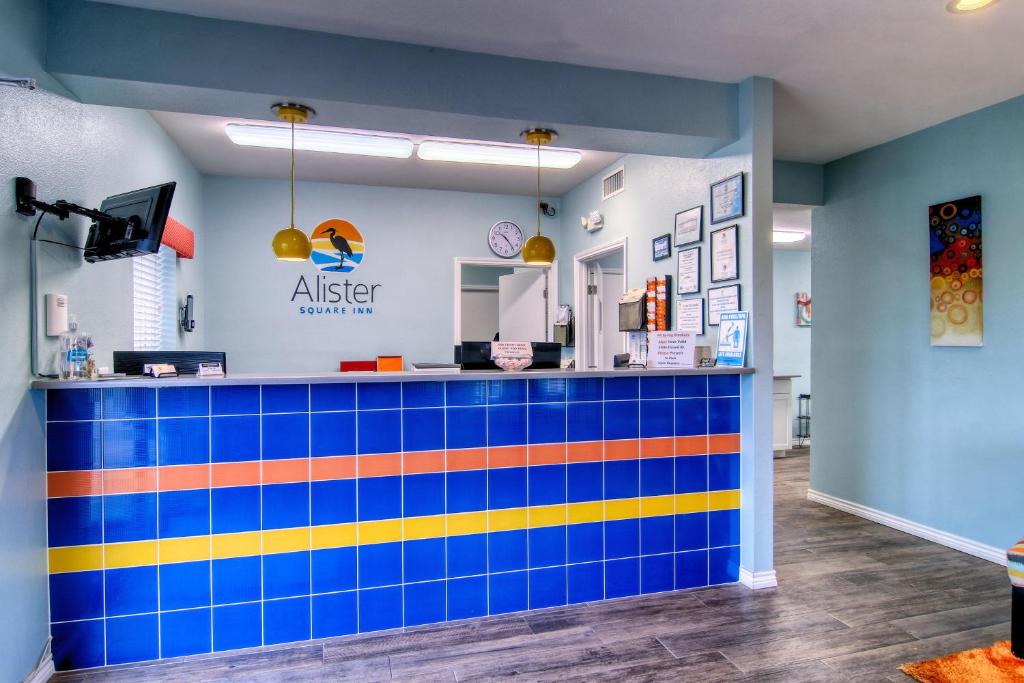 a tile counter in a waiting room at aissing pharmacy at Alister Square Inn in Port Aransas