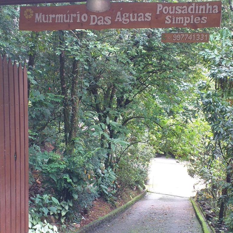 a sign that reads muthaho dos at Pousada Murmúrio das Águas in São Francisco Xavier