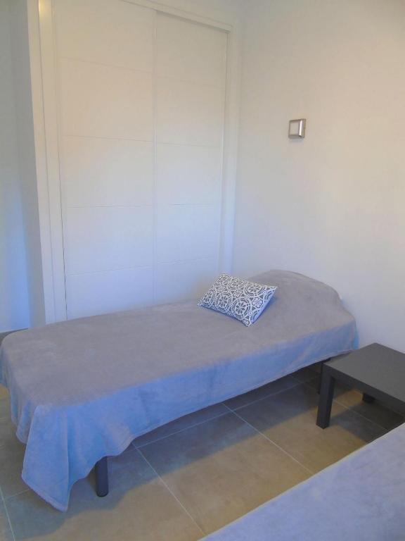 Postel nebo postele na pokoji v ubytování Appartement proche mer avec piscine Rosas