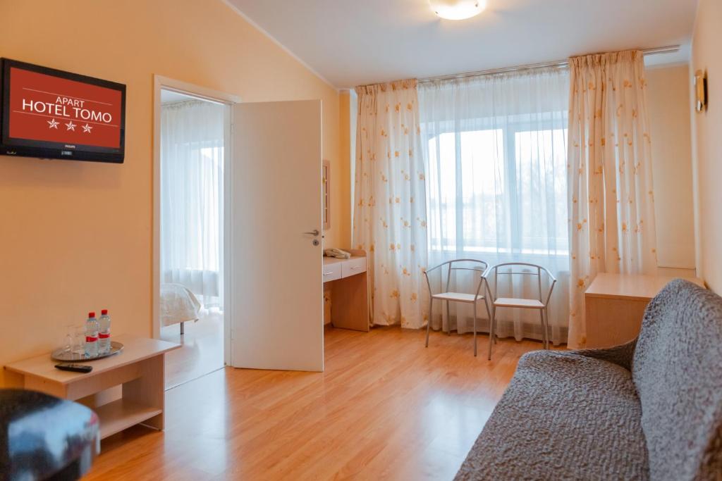 TV a/nebo společenská místnost v ubytování Apart Hotel Tomo FREE PARKING