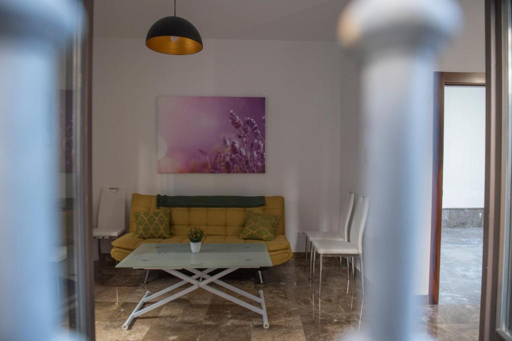 Posedenie v ubytovaní Apartamentos Luxury Puente de Triana