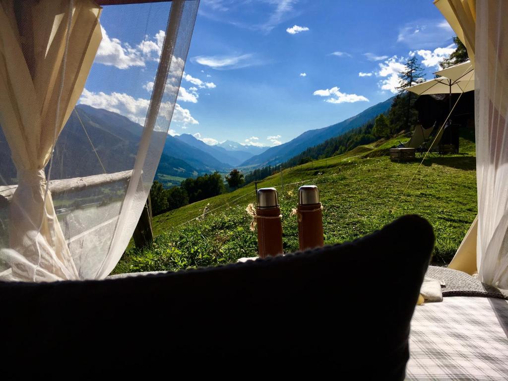 a view from a tent with a view of a mountain at Naturlodge Gadestatt in Loch