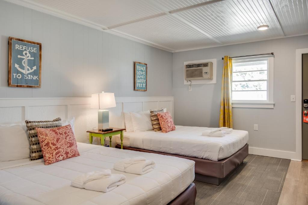 Postel nebo postele na pokoji v ubytování Tar Heel Motel