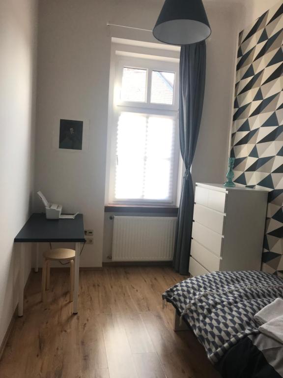 Postel nebo postele na pokoji v ubytování French Touch Apartment with Free Parking