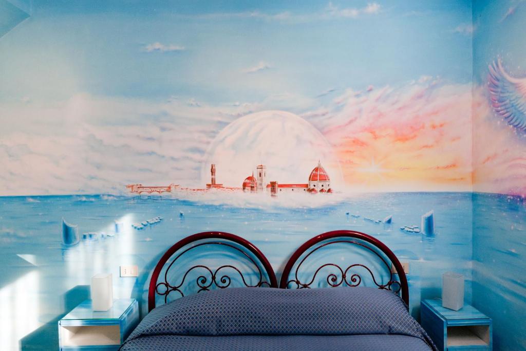 Postel nebo postele na pokoji v ubytování Hotel Masaccio
