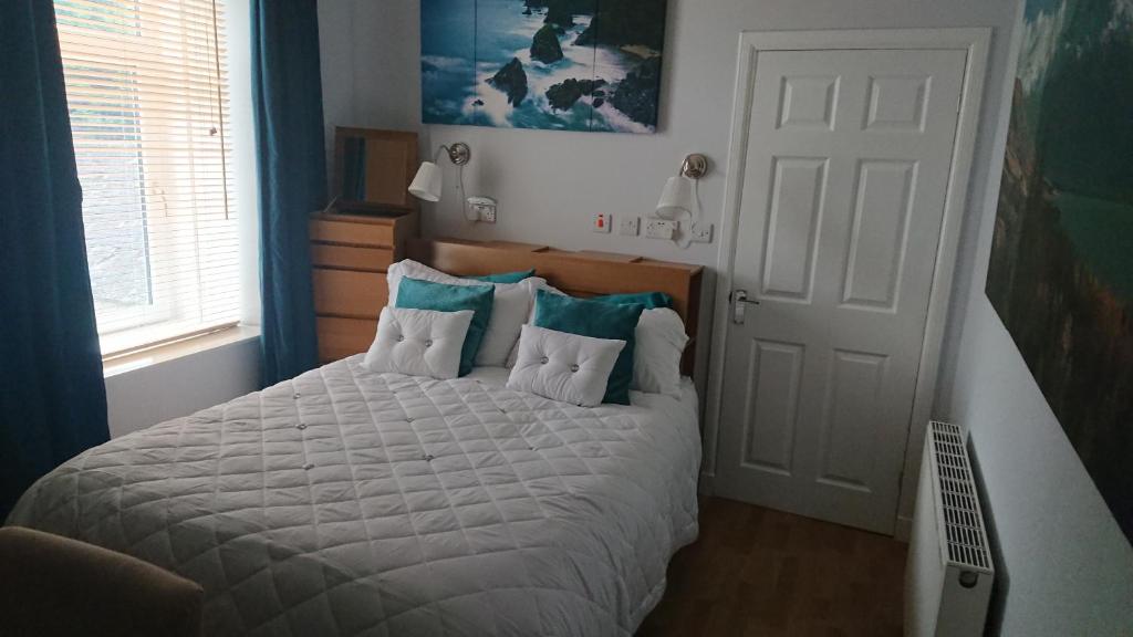 Postel nebo postele na pokoji v ubytování Nethermains House