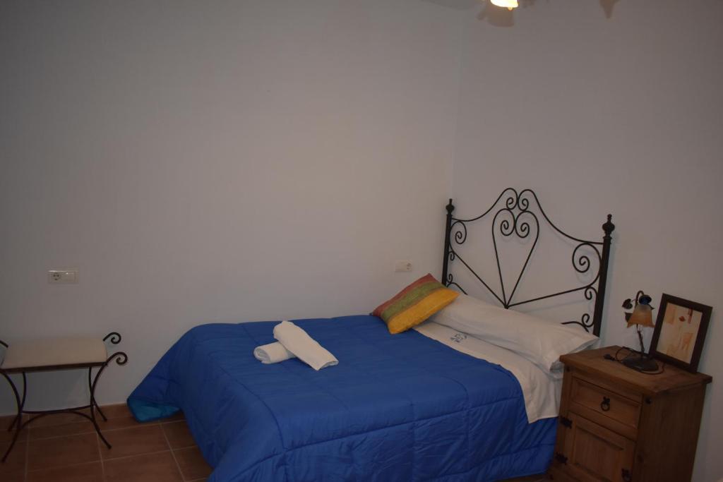 Postel nebo postele na pokoji v ubytování Alojamientos Rurales la Loma
