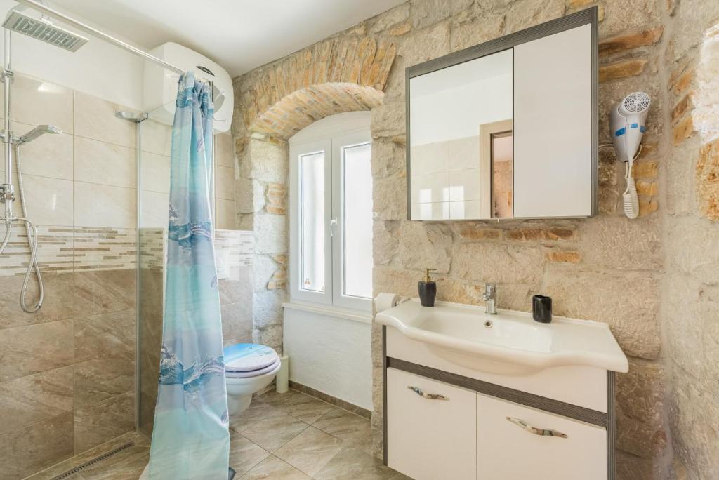 Koupelna v ubytování Kovacic Rooms