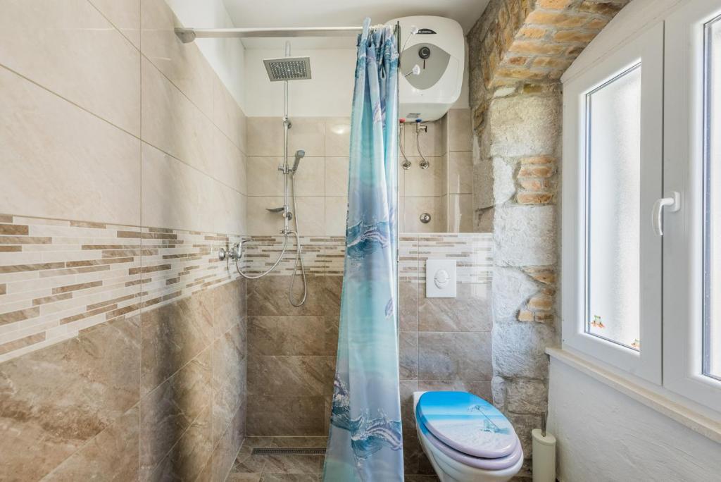 Koupelna v ubytování Kovacic Rooms