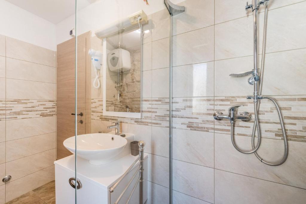 Koupelna v ubytování Kovacic Rooms