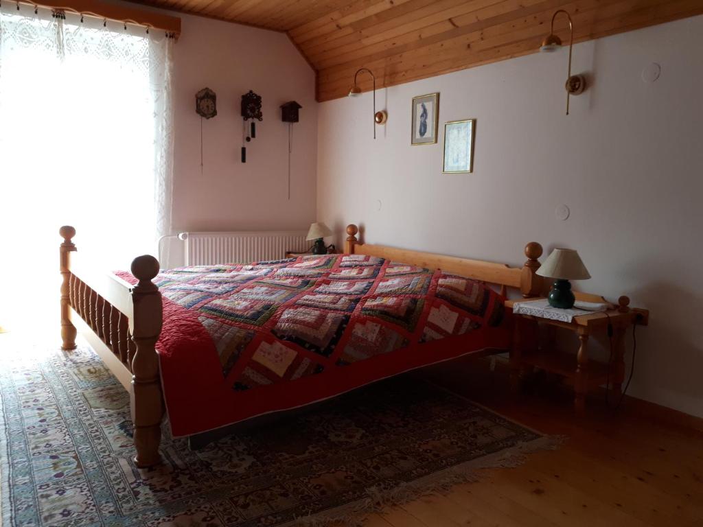 Postel nebo postele na pokoji v ubytování Holiday House Jasna