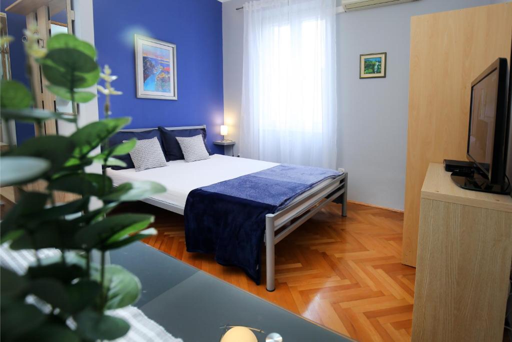 Posteľ alebo postele v izbe v ubytovaní SPLIT CHIC Studio