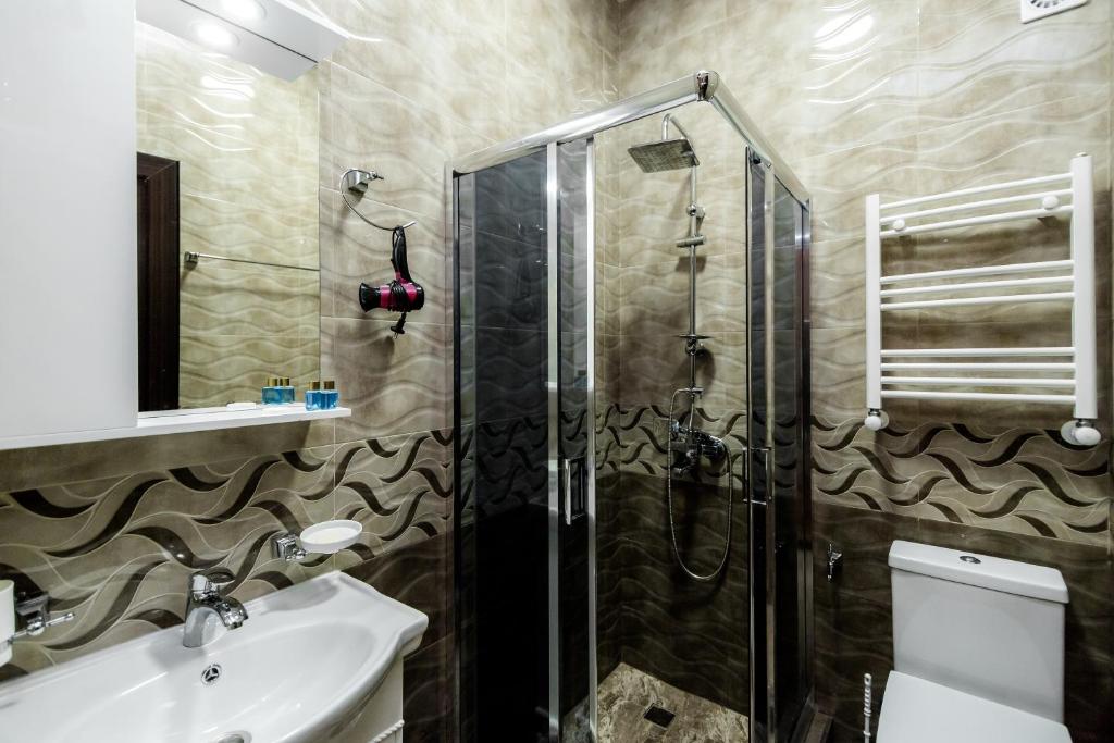 Koupelna v ubytování Star Hotel