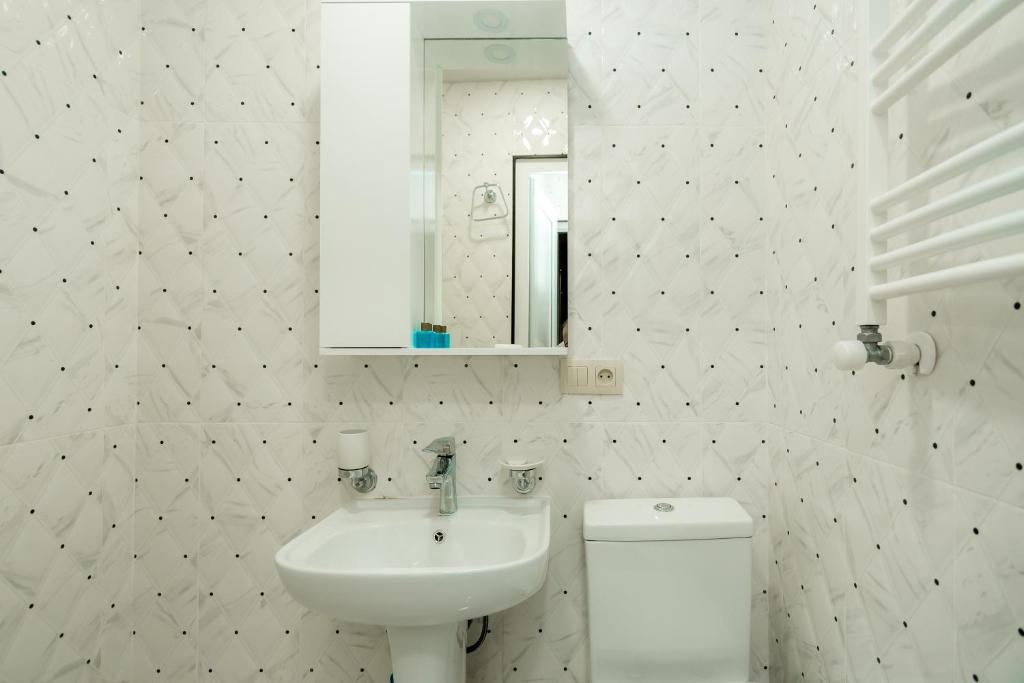 Koupelna v ubytování Star Hotel