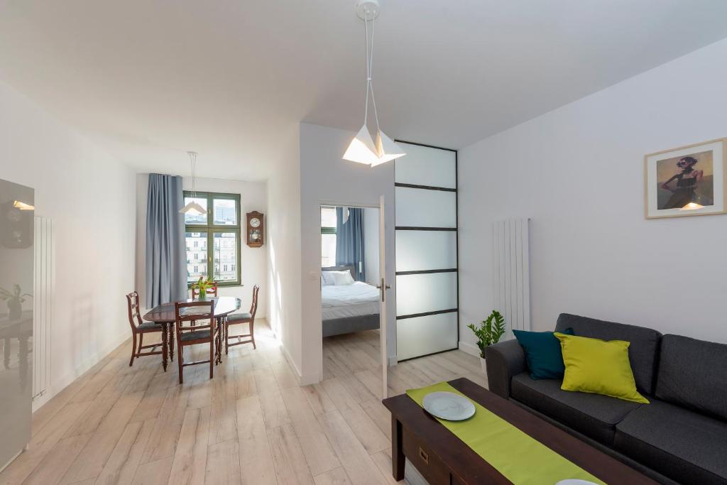 Posteľ alebo postele v izbe v ubytovaní PROVENIR HOME STRZELECKA 25