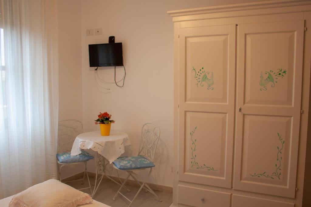 TV a/nebo společenská místnost v ubytování B&B Giu&Gio