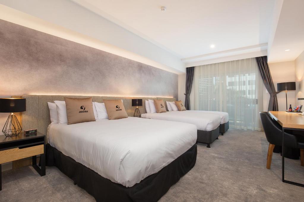Jephson Hotel & Apartmentsにあるベッド