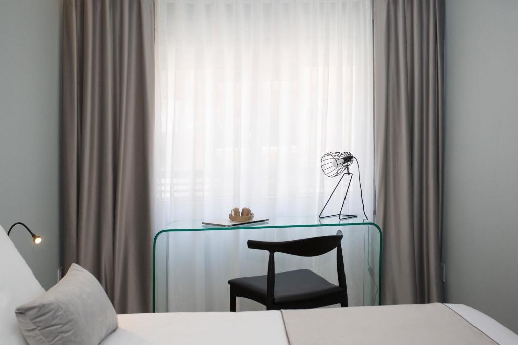 Posteľ alebo postele v izbe v ubytovaní Palacios Rooms