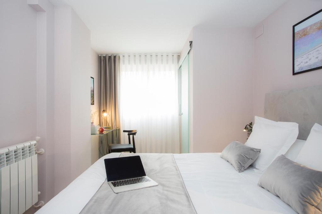 Posteľ alebo postele v izbe v ubytovaní Palacios Rooms