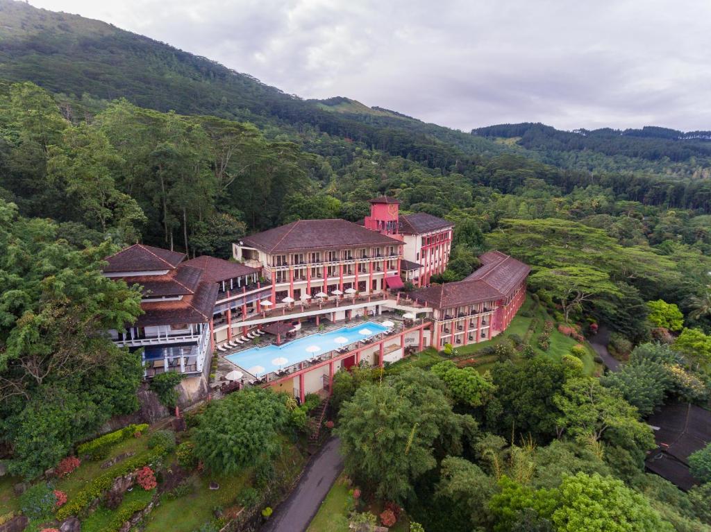 an aerial view of a building with a swimming pool at Amaya Hills Kandy in Kandy