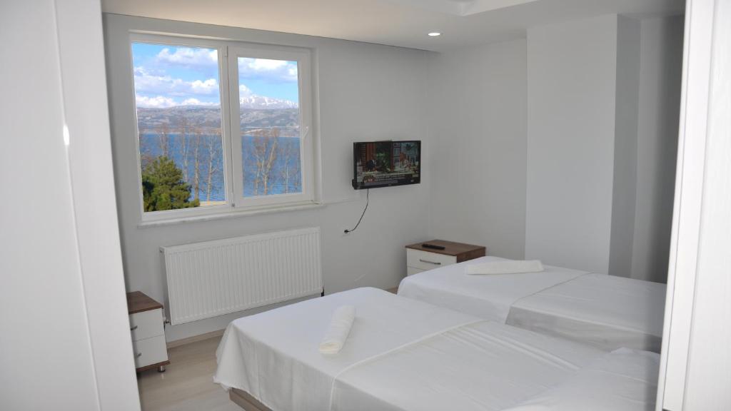 Postel nebo postele na pokoji v ubytování Hannapart Otel